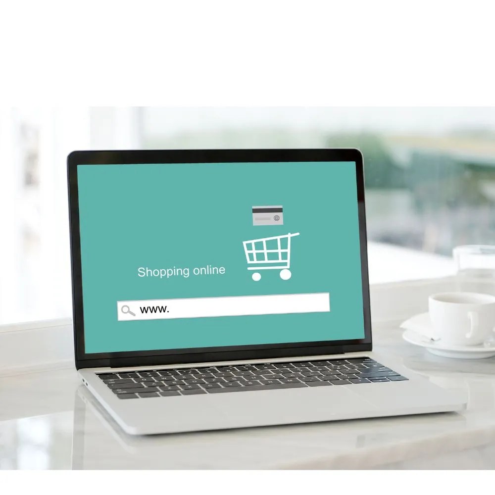 Website copy and product descriptions. laptop open to e-commerce store on table. freelance content writer